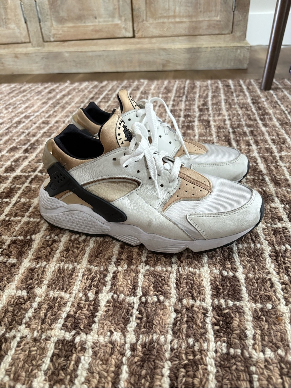 Nike Air Huarache White and Beige Athletic Sneakers with Black Heel Cage.